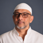Man in white cap and glasses mohammed kafil ansari